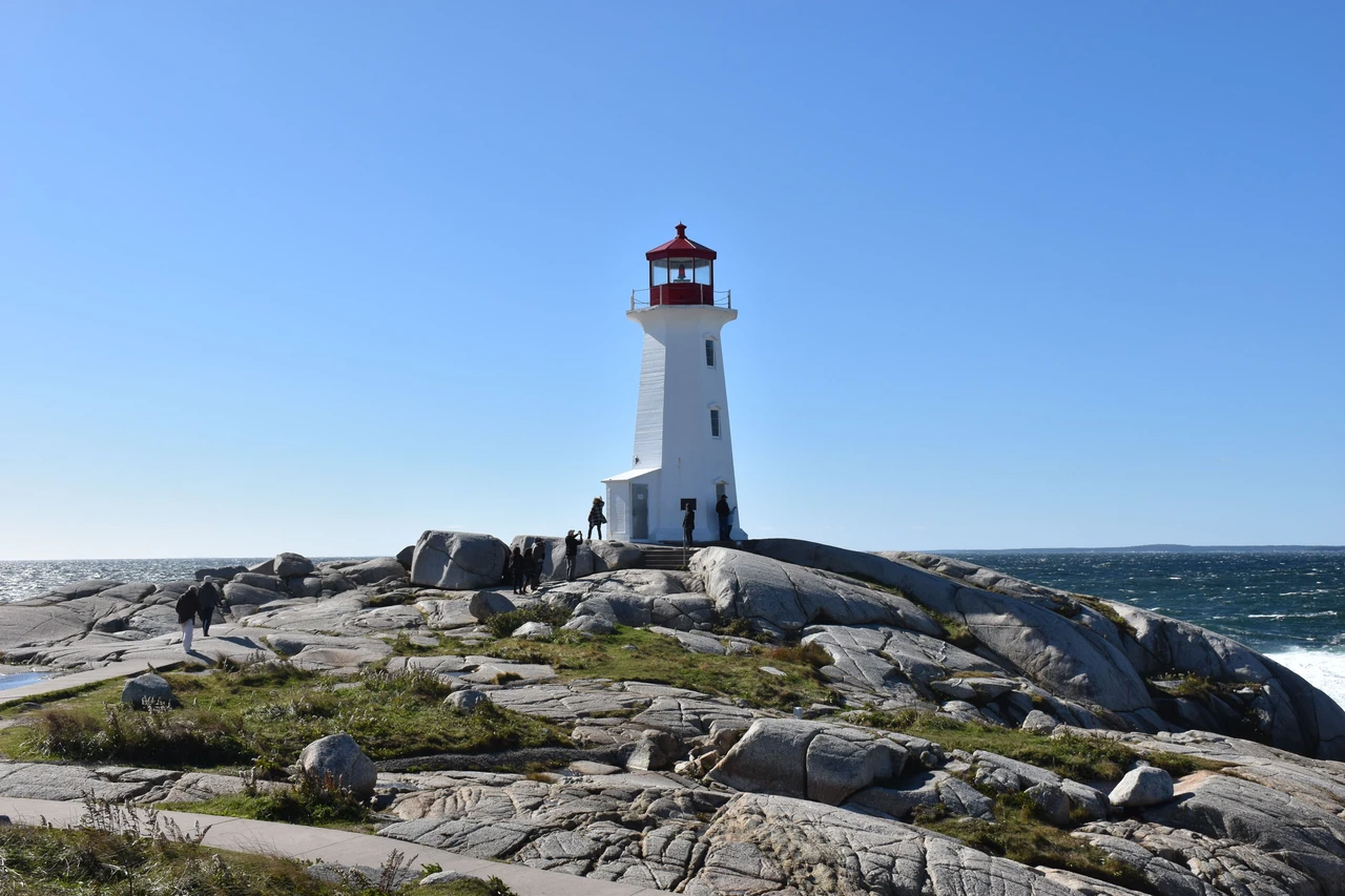 Peggy's Cove Lighthouse on smooth granite rock above the North Atlantic, Nova Scotia
